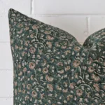 A very close image of the corner of a floral designer cushion. It has a large size.