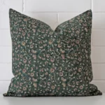 Vibrant floral cushion cover constructed from designer fabric and shown in a large size.