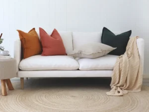 Vibrant tones are what colour cushions that look great on a white sofa.