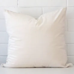 An alluring velvet large cushion cover in white.