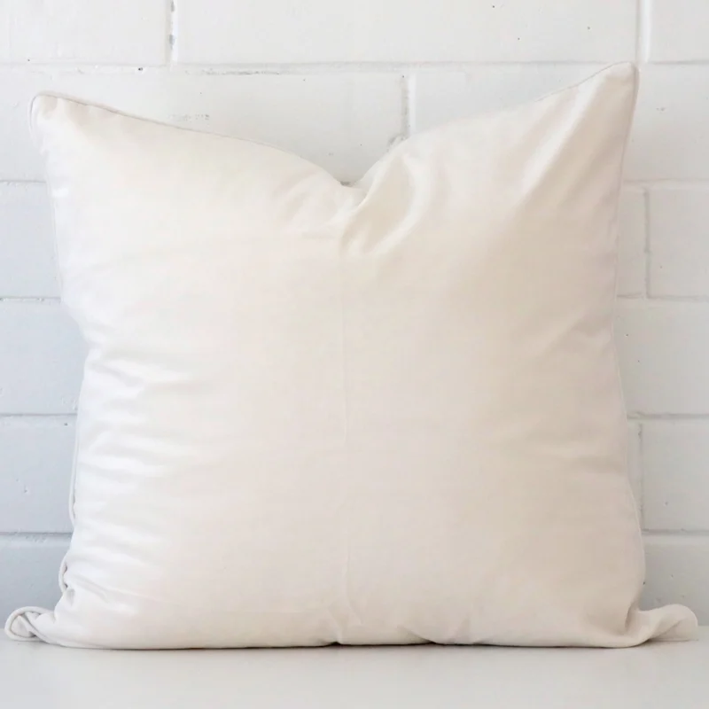 An alluring velvet large cushion cover in white.